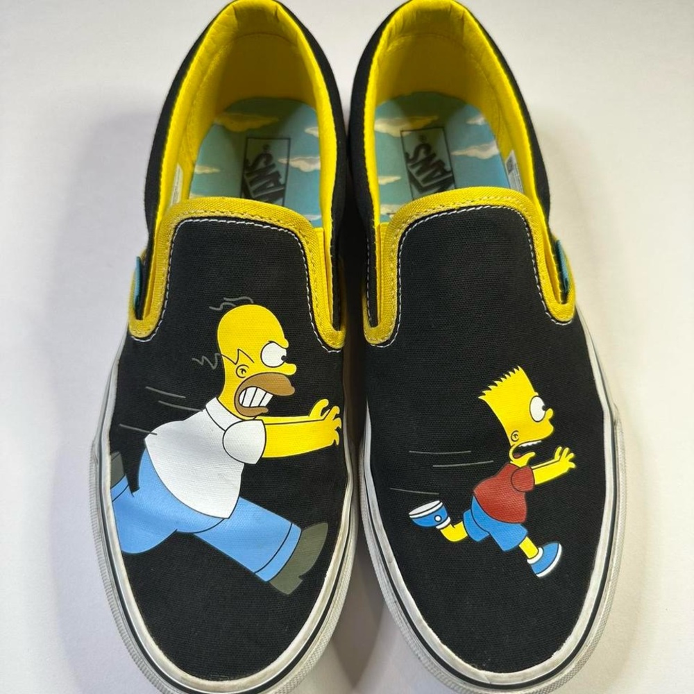 Vans Black and Yellow Cartoon Slip-On Sneakers